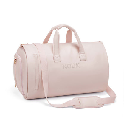 Avon weekendväska rosa – framsida med axelrem