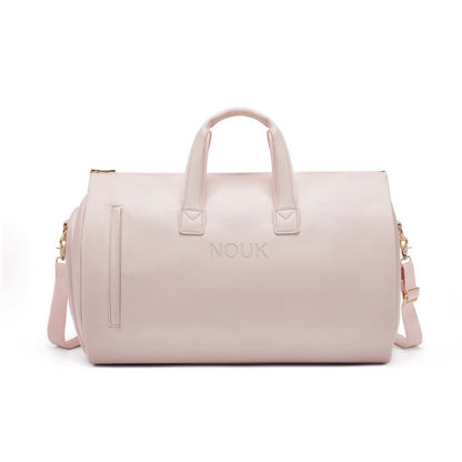 Avon weekendväska rosa – framsida med axelrem